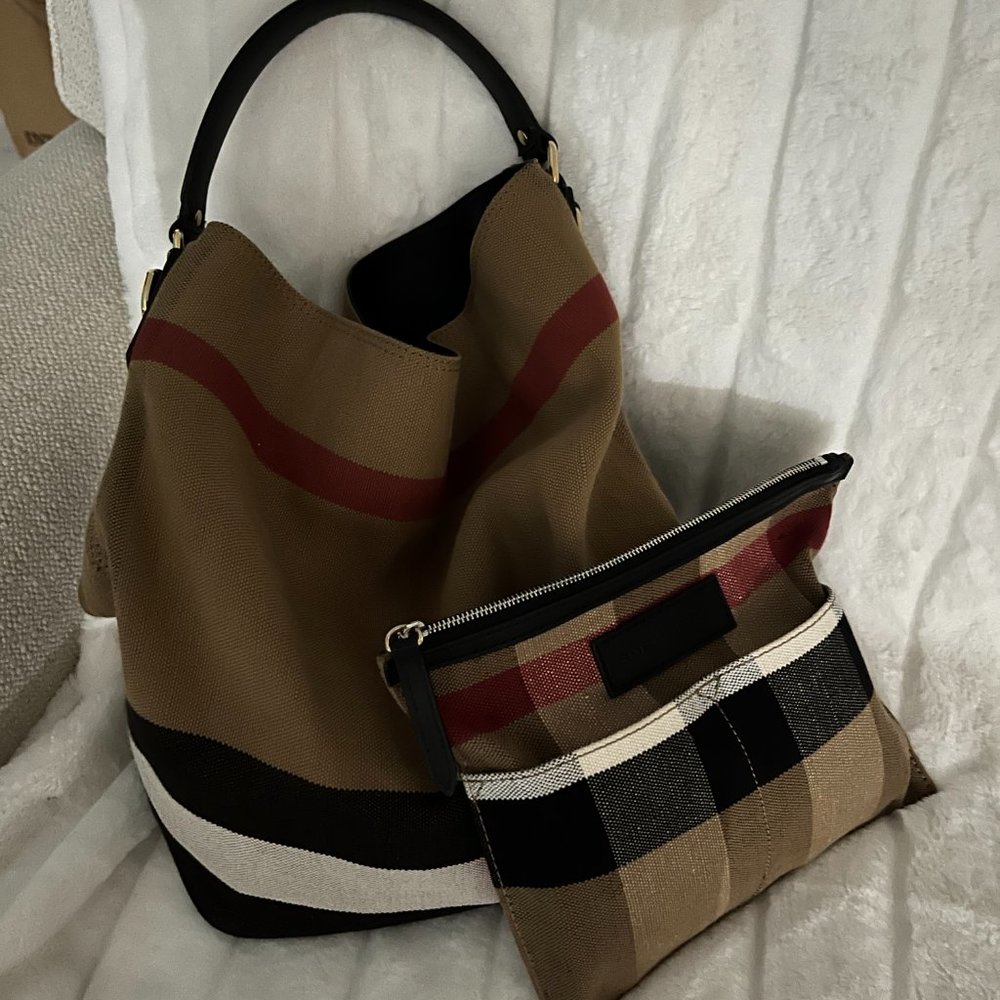Burberry Ashby Bucket Bag with attached pouch inside.